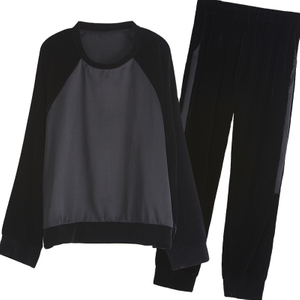 Conjuntos de pantalones largos de manga larga de chándal de terciopelo negro cómodo de 2 piezas para mujer al por mayor